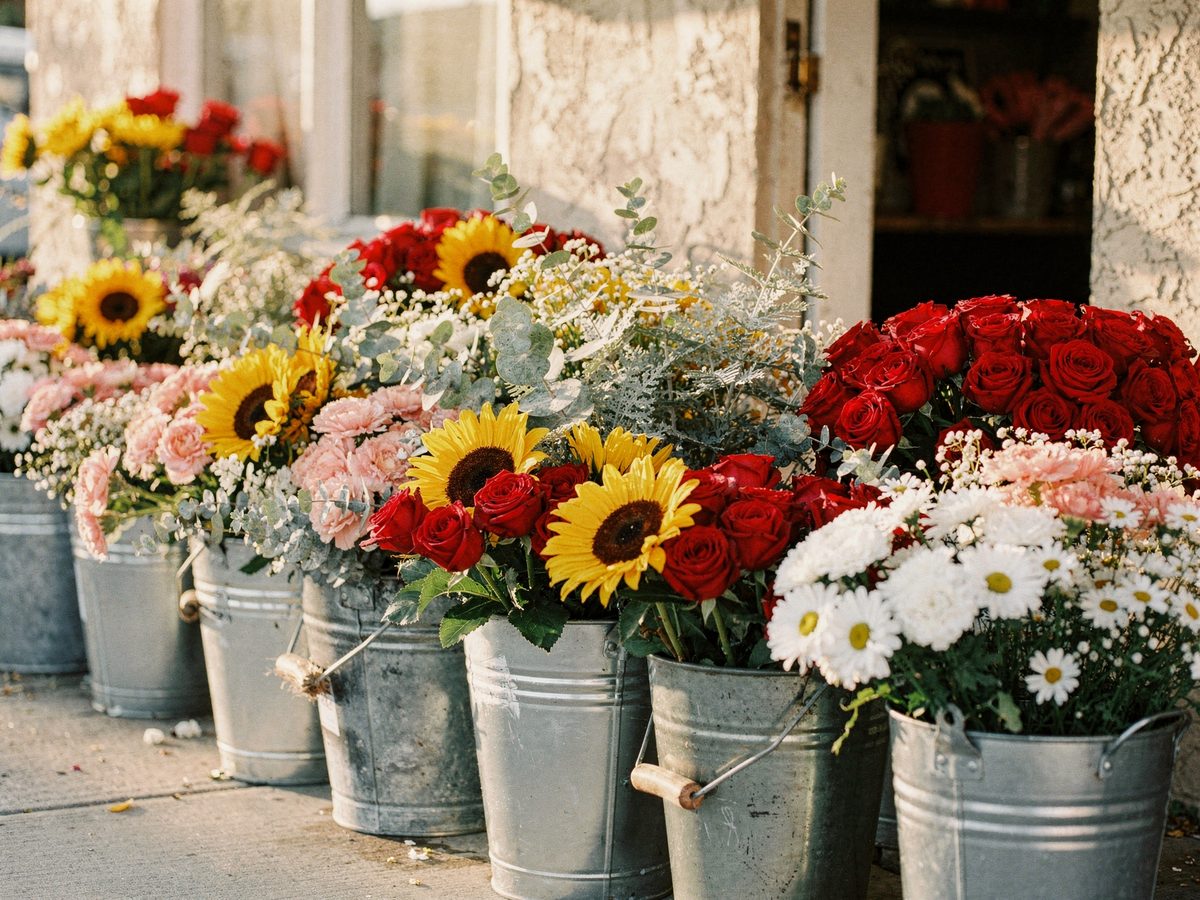 Buckets of fresh cut flowers outside a neighborhood flower shop in San Diego
