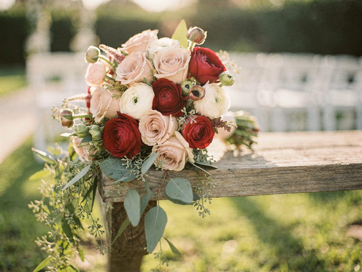 Blush and red garden-rose bridal bouquet for a San Diego wedding